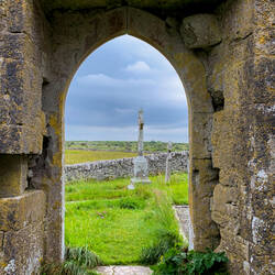Glimpse of the cemetery through the door of the Carran Church ruins ... the Burren, Ireland.