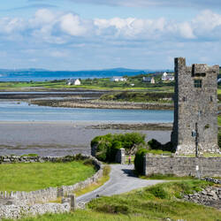 Mui has parked the car already and is heading to check out Pouldoody Bay — Shanmuckinish Castle.