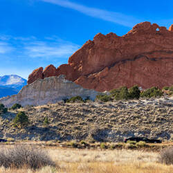 Garden of the Gods ... Pikes Peak peeking out between the red rocks — Colorado Springs, CO.