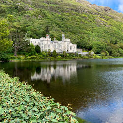 Kylemore Abbey reflected on Pollacappul Lake — Connamara, Ireland.