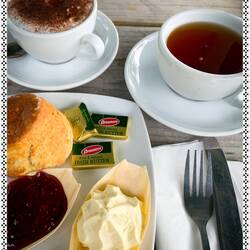Scones, jam & clotted cream with hot beverages — @ the Tea House @ Kylemore Abbey, Ireland.