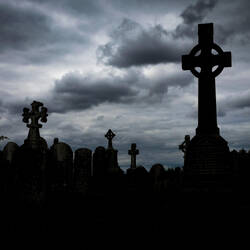 Gravestones and crosses as a skyline at the cemetery @ Clonmacnoise, Ireland.