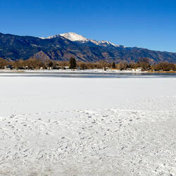 Panorama of Prospect Lake with the Front Range as a backdrop — Colorado Springs, CO.