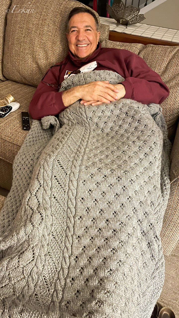 Mui didn't wait to use the afghan until he was in bed! — Colorado Springs, CO.