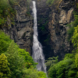 One of the many waterfalls streaming down the walls of Aurlandsfjorden — Norway.
