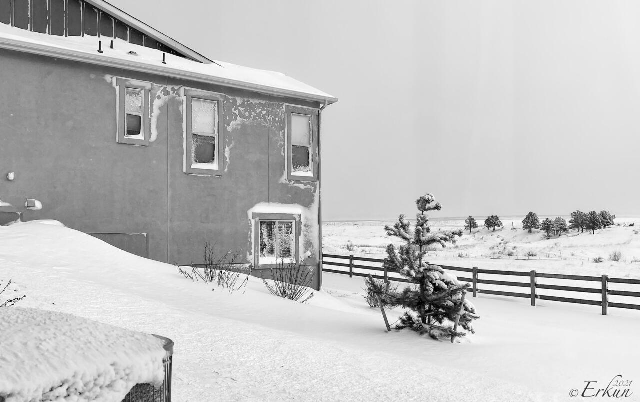 The wind blew most of the accumulation towards our neighbor — Colorado Springs, CO.