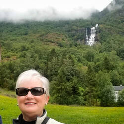 A "we are at the trailhead for Brekkefossen" selfie — Flåm, Norway.
