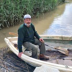 When I hit this river I had no Idea what to do. Then this man came down from the village and rowed me over and