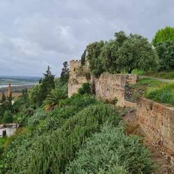 Old fortifications of the Alcacer overlooking the navigable tidal river