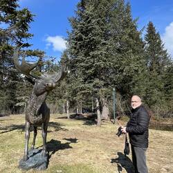 Deniz finds a moose ... too bad it's just a statue — Alyeska Resort, Girdwood, AK.