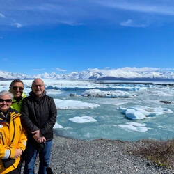 A "we are at Lake George National Natural Landmark" selfie — Knik Glacier Tour, AK.