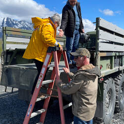A five-step ladder is the only way up into the bed of the truck — Knik Glacier Tour, AK.