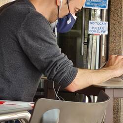 This man has a FFP2 mask under his other mask at a restaurant table. and got angry when I didn't put my mask b