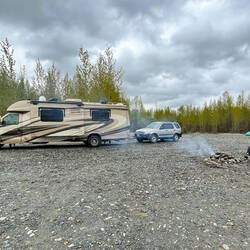 Nope, a little rain is not going to dampen our fun — boondocking along the Susitna River.
