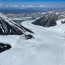 One of the many impressive glaciers of the Alaska Range — Peak Experience Flight Seeing, Alaska.