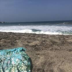 Tan lines and beach waves