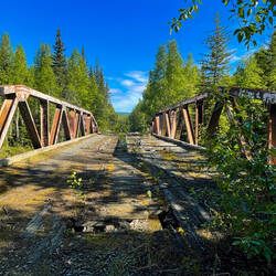 The old wood-decked Tatalina River Bridge — Elliott Hwy, AK.