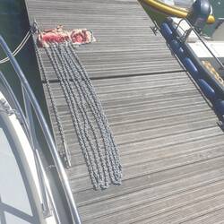 Anchor chain all laid out and painted red every 5m.