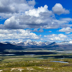 View of the Alaska Range from the Maclaren Summit — Denali Hwy, AK.
