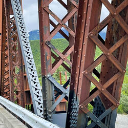 Grey/black sections are the repaired sections on the repaired fourth span — Million Dollar Bridge.