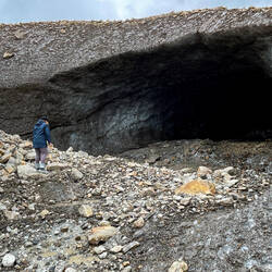 Carefully approaching the ice cave ... but not going inside — Miles Lake, AK.