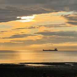 Golden Sunrise over Kachemak Bay ... from the Heritage RV Park on the Homer Spit, AK.