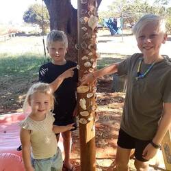 Adding their name shell to the pole