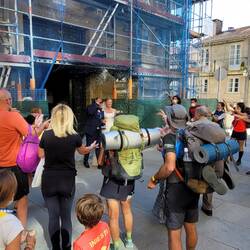 A peregrino wedding. Everyone with backpack just walked into SdC today. PS that's rice in the air.