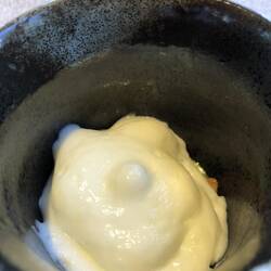 Gurkenkreneis mit Forellenkaviar, Kopfsalatcreme & Buttermilchschaum