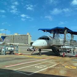 Our air chariot ... and our hotel in the background — IAH ... Houston, TX.