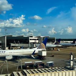 A bunch of United planes are poised for their flights — United Lounge @ Terminal E ... IAH, TX.