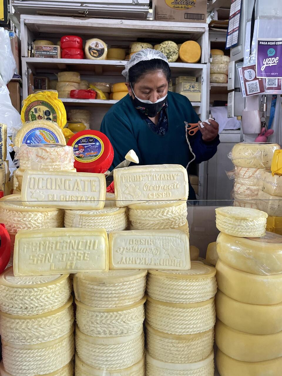 Cheese vendor at San Pedro market