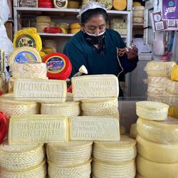 Cheese vendor at San Pedro market