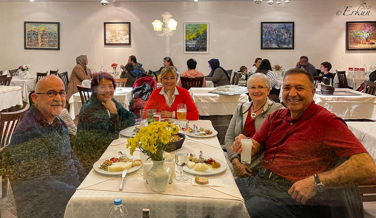 The waiter insisted on taking the photo through the dirty window — Regulateur, Eskişehir.