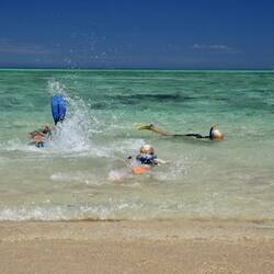 Are they fish or are they children? We have to drag them out of the water everyday day.