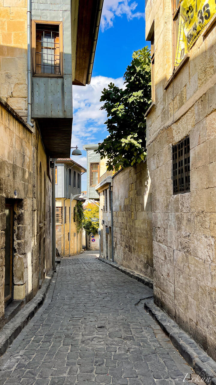 A narrow street lined with stone houses — Bey Mahallesi ... Gaziantep.