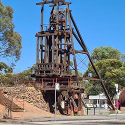 An old pit head-lots of mining artefacts placed around the town