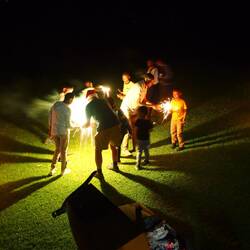 Father Christmas lighting sparklers