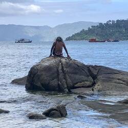 Our very own little mermaid or maybe just some longhaired topless hippy!