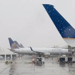 Big flat flakes are a-flying @ DEN — Denver, CO.