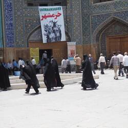 Going to Friday prayer at the central mosque of Esfahan