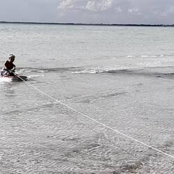 Being towed behind the car