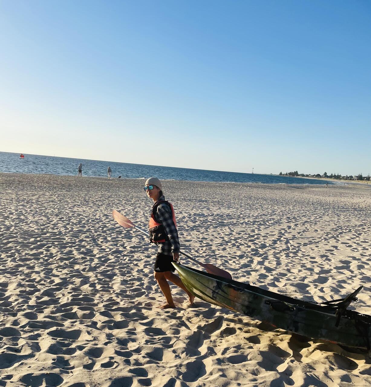 Taking the kayak into the waves for a bit of fun and subset watching