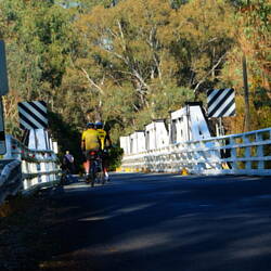 Crossing the river on a bridge from the late 1800s