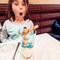 She's never had such a fancy dessert with a kid's meal. That's bubblegum sauce.