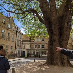 The guide is pointing at the second story windows of the room where Mary Shelley wrote Frankenstein