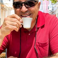 Mui orders a cup of coffee to wrap up our lunch — Konak, İzmir.