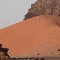 Large sand dune beside one of the many camps in Wadi Rum