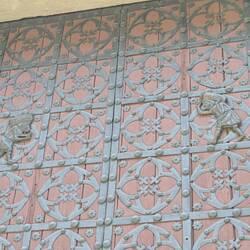 On the doors is a tribute to the working class men who carried the stones after working all day