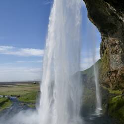 Going behind Seljalandsfoss waterfall